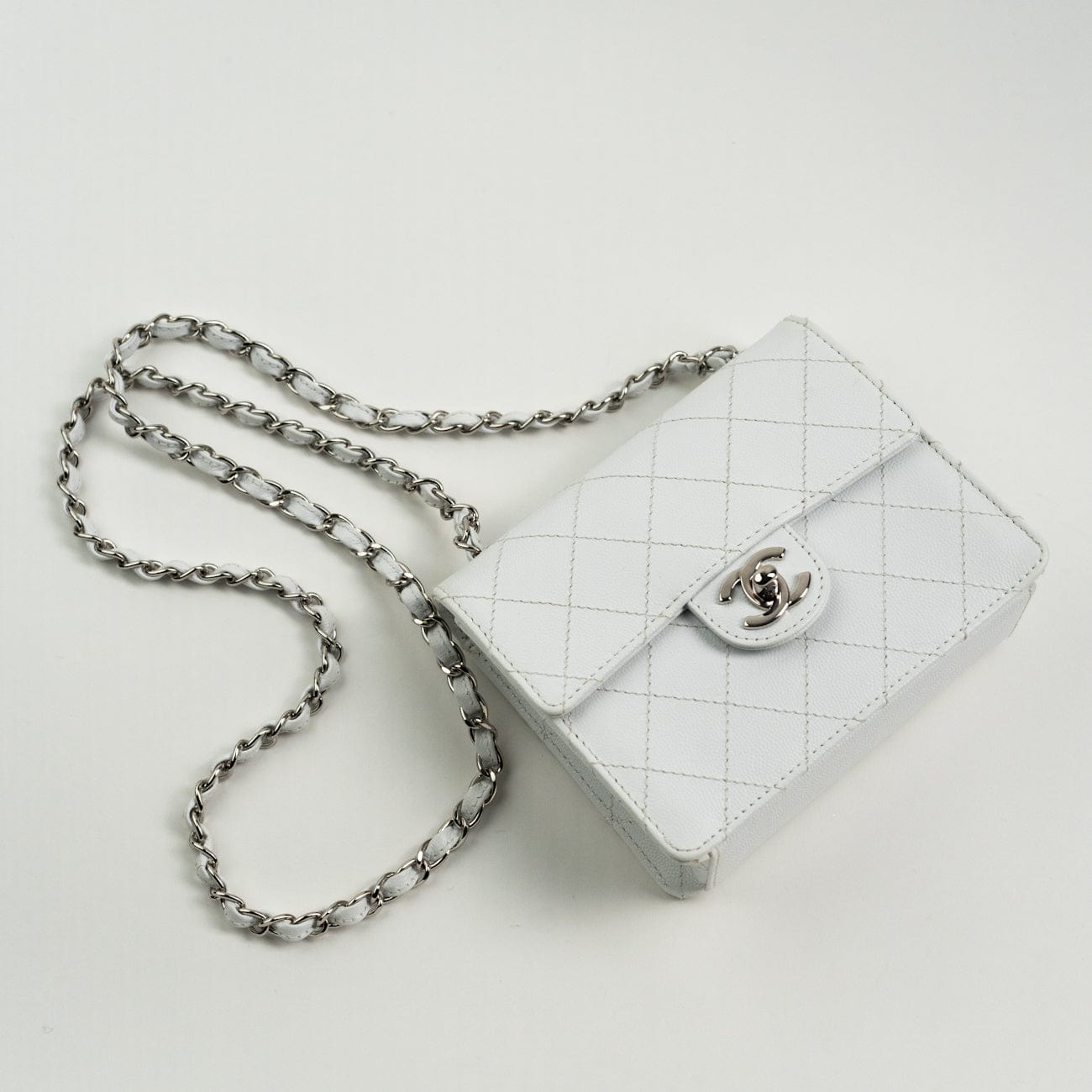 Buy CHANEL Quilted Vintage Mini Square Flap White Caviar Silver