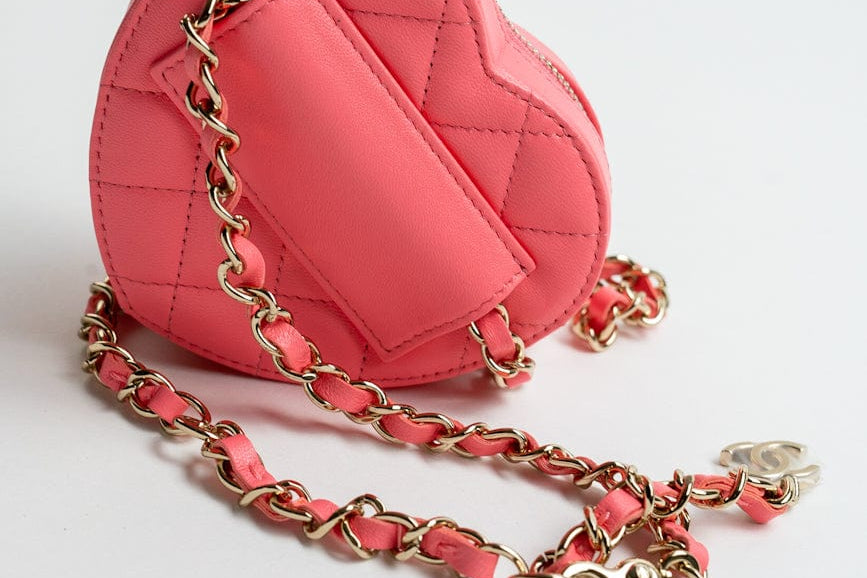 CHANEL Belt Bag Pink 22S CC In Love Heart Zipped Pink Lambskin Quilted Belt Bag LGHW - Redeluxe