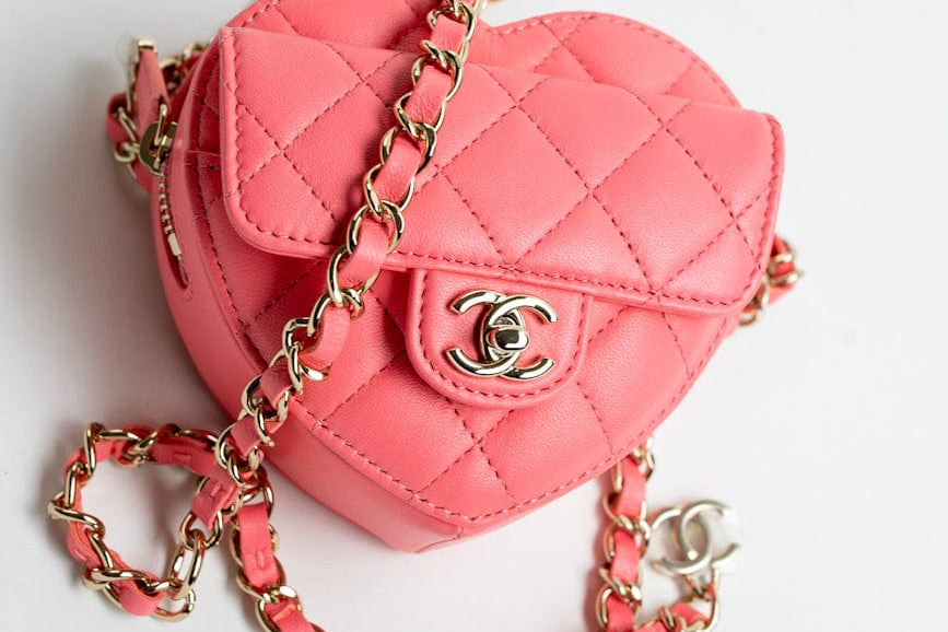 CHANEL Belt Bag Pink 22S CC In Love Heart Zipped Pink Lambskin Quilted Belt Bag LGHW - Redeluxe