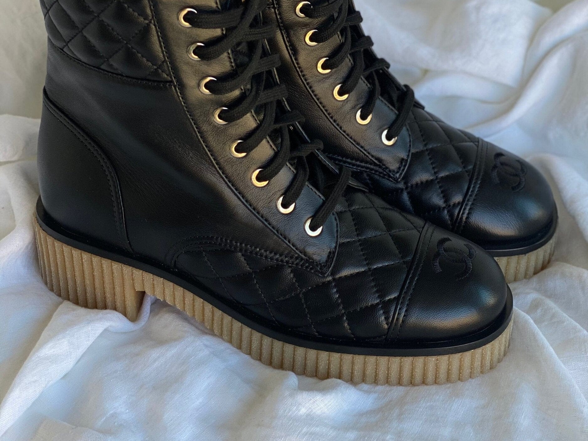 CHANEL Boots CHANEL 21B Calfskin Quilted Black Caviar Quilted CC Logo Combat Boots - Redeluxe