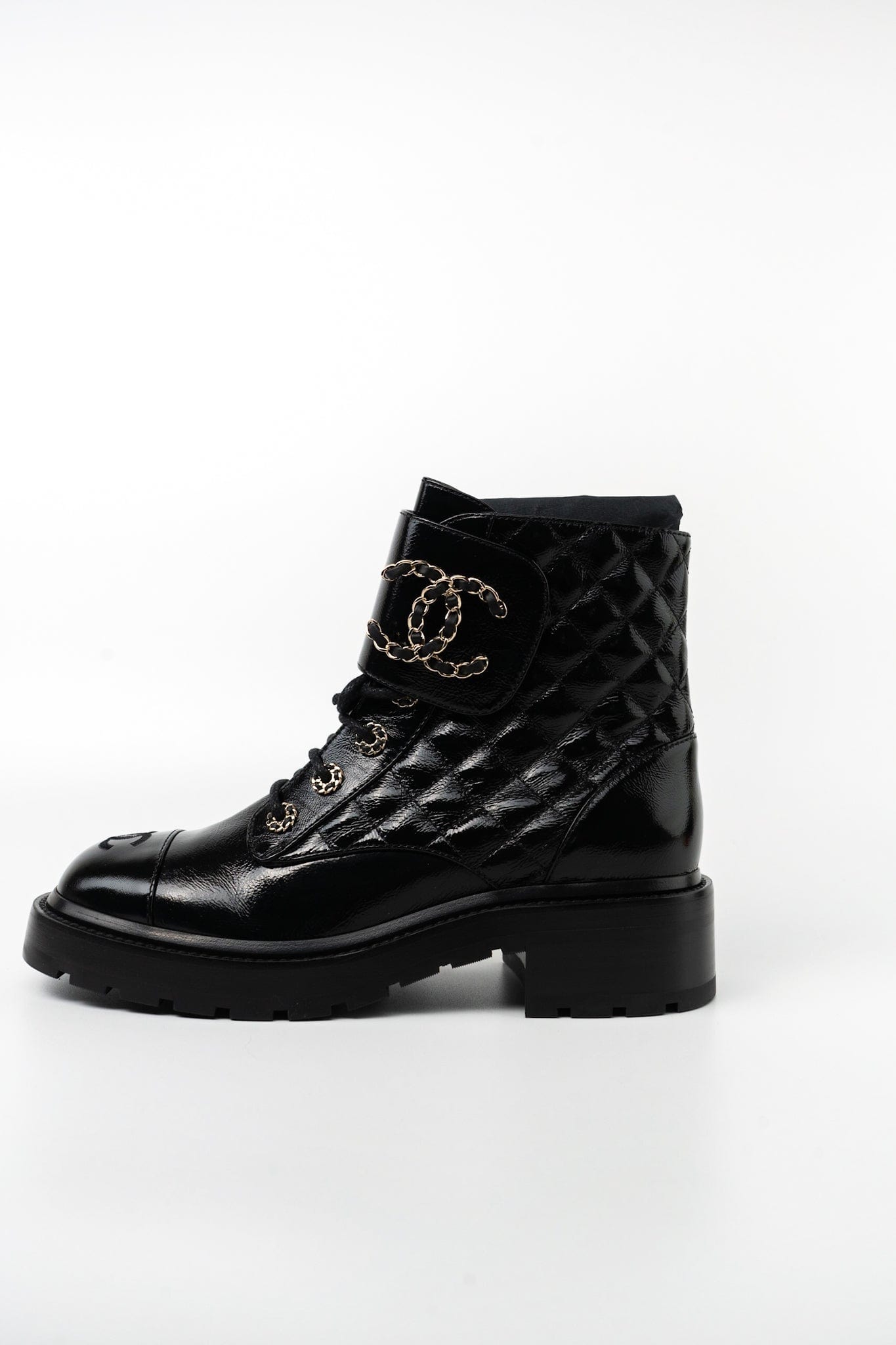 Exquisite CHANEL Shinny Calfskin Quilted Lace Up Combat Boots Buy Now for a Luxury Upgrade REDELUXE