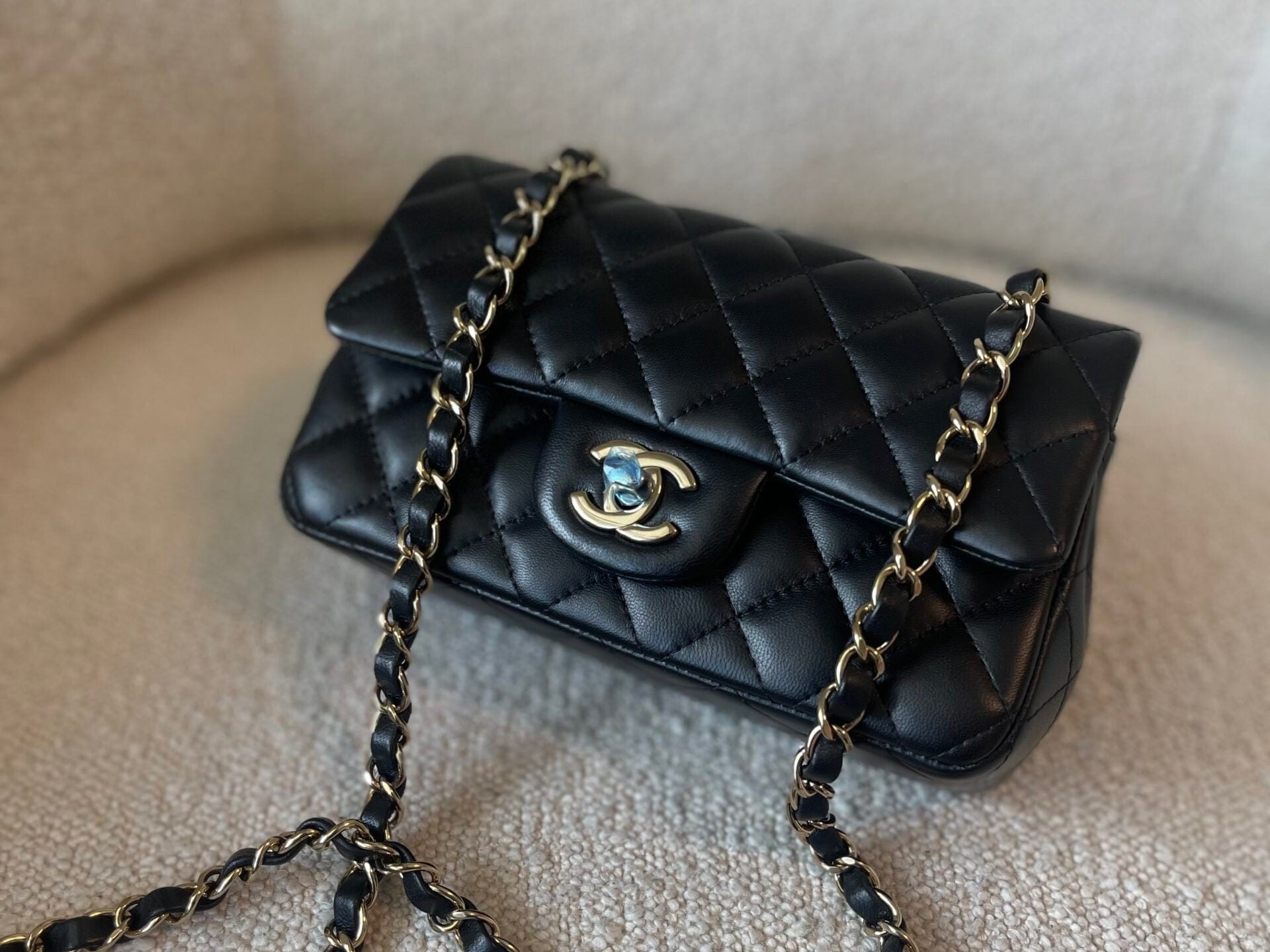 CHANEL Handbag 21K Black Lambskin Quilted Mini Rectangular Single Flap Light Gold Hardware - Redeluxe