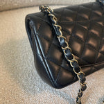 CHANEL Handbag 21K Black Lambskin Quilted Mini Rectangular Single Flap Light Gold Hardware - Redeluxe