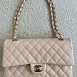 CHANEL Handbag 22C Light Beige Caviar Quilted Classic Flap Medium LGHW - Redeluxe