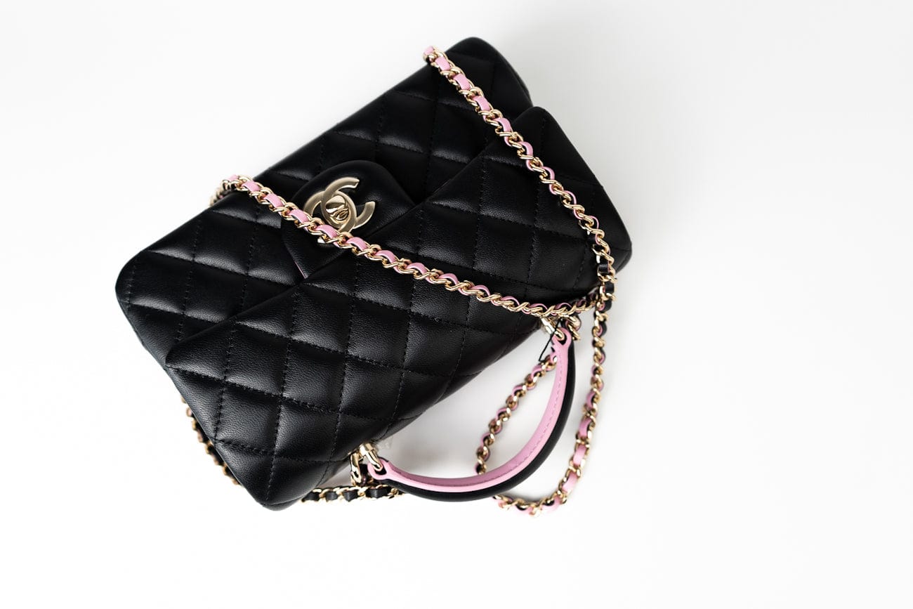 CHANEL Handbag 23P Mini Top Handle Black/Pink Lambskin Quilted w/ Light Gold Hardware - Redeluxe