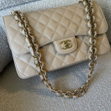 CHANEL Handbag Beige Clair Caviar Quilted Jumbo Classic Flap LGHW - Redeluxe