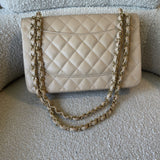 CHANEL Handbag Beige Clair Caviar Quilted Jumbo Classic Flap LGHW - Redeluxe