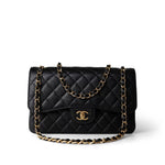 CHANEL Handbag Black Black Caviar Quilted Jumbo Classic Flap Gold Hardware - Redeluxe