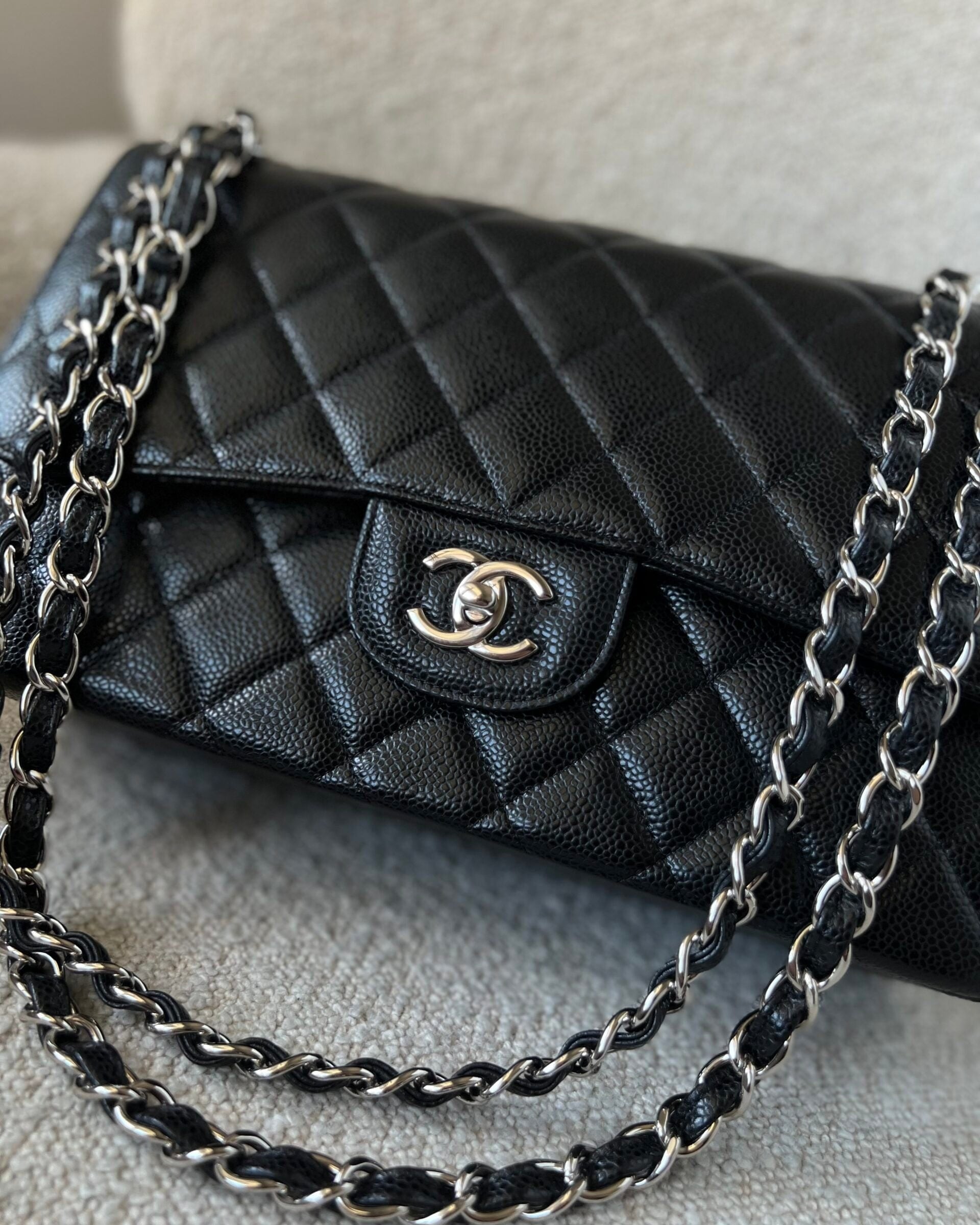 CHANEL Handbag Black Caviar Quilted Jumbo Classic Flap Silver Hardware - Redeluxe