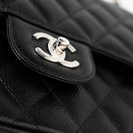 CHANEL Handbag Black Jumbo Caviar Quilted Classic Flap Silver Hardware - Redeluxe