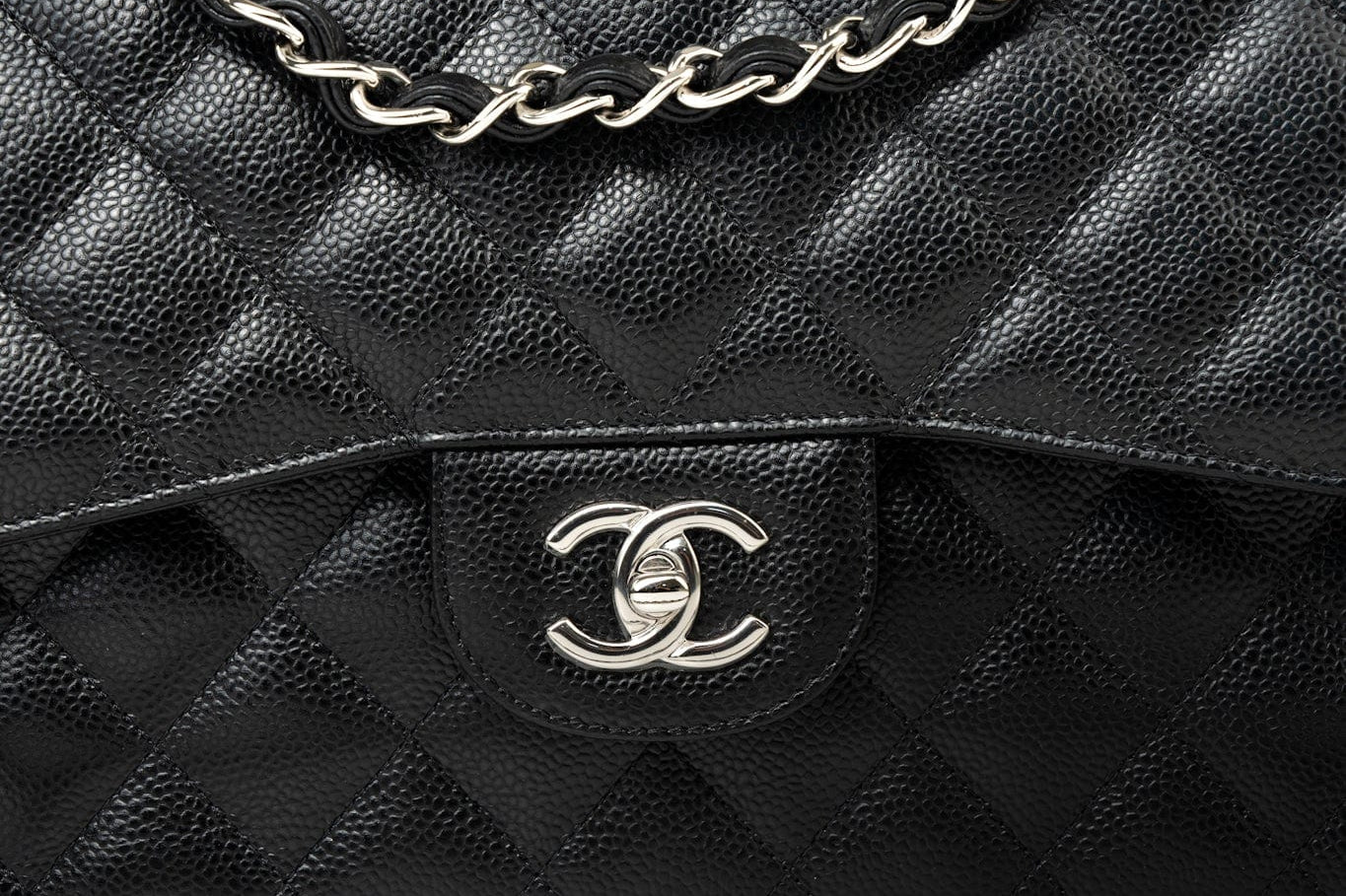 CHANEL Handbag Black Jumbo Caviar Quilted Classic Flap Silver Hardware - Redeluxe