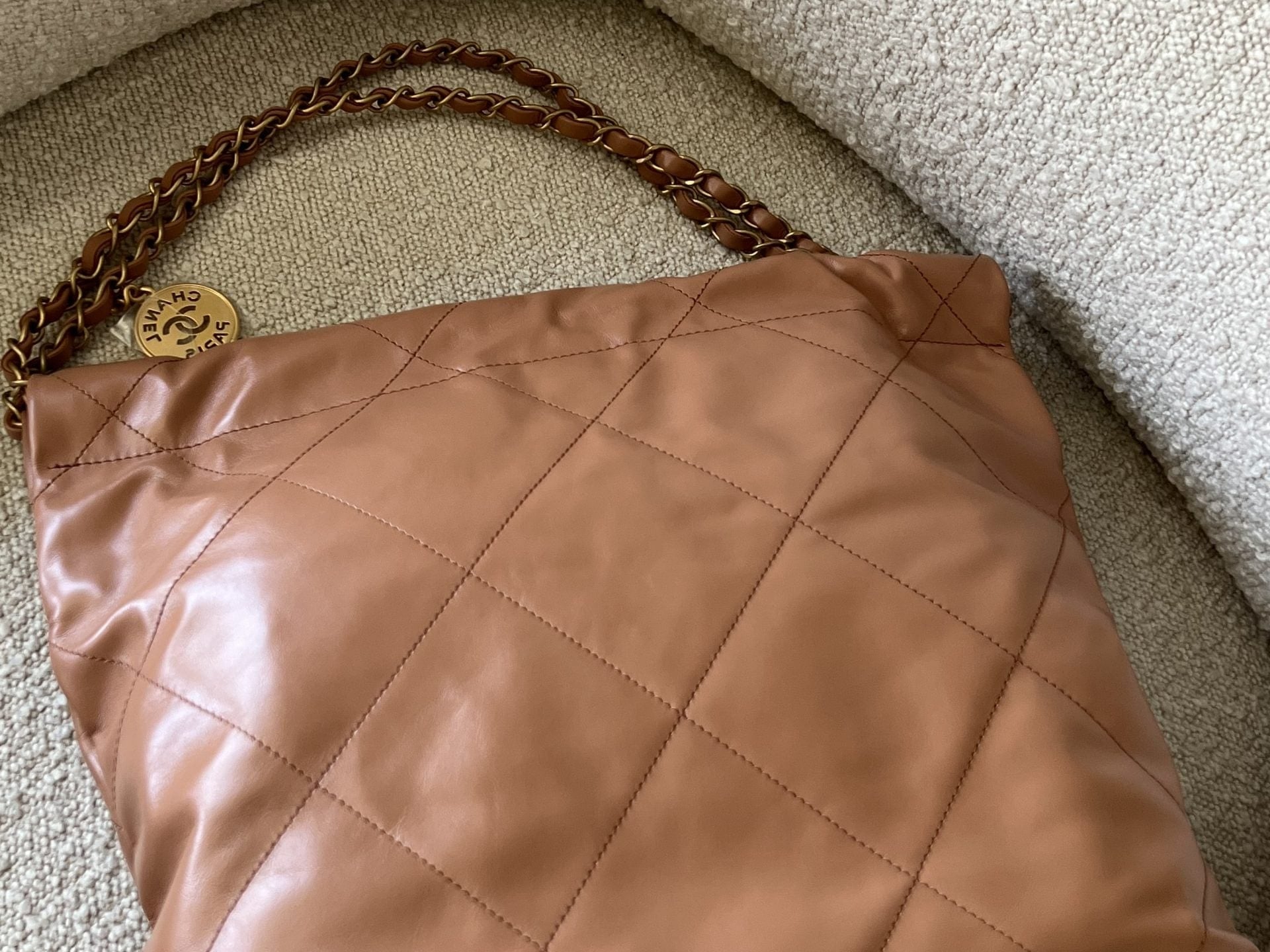 CHANEL Handbag Caramel Shiny Calfskin Quilted 22 Drawstring Bag Small GHW - Redeluxe