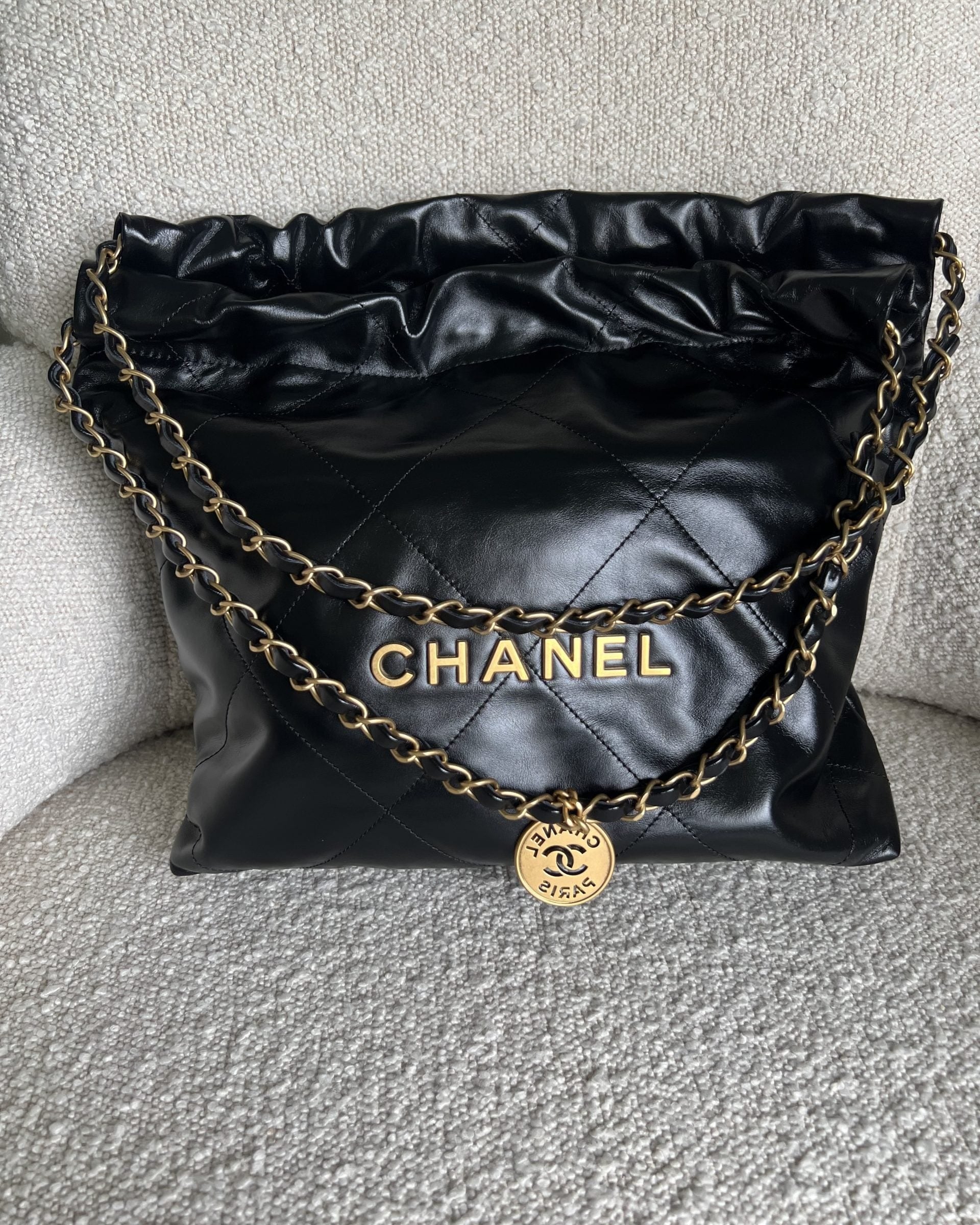 CHANEL Handbag Chanel 22 Shiny Calfskin Quilted Drawstring Bag GHW - Redeluxe