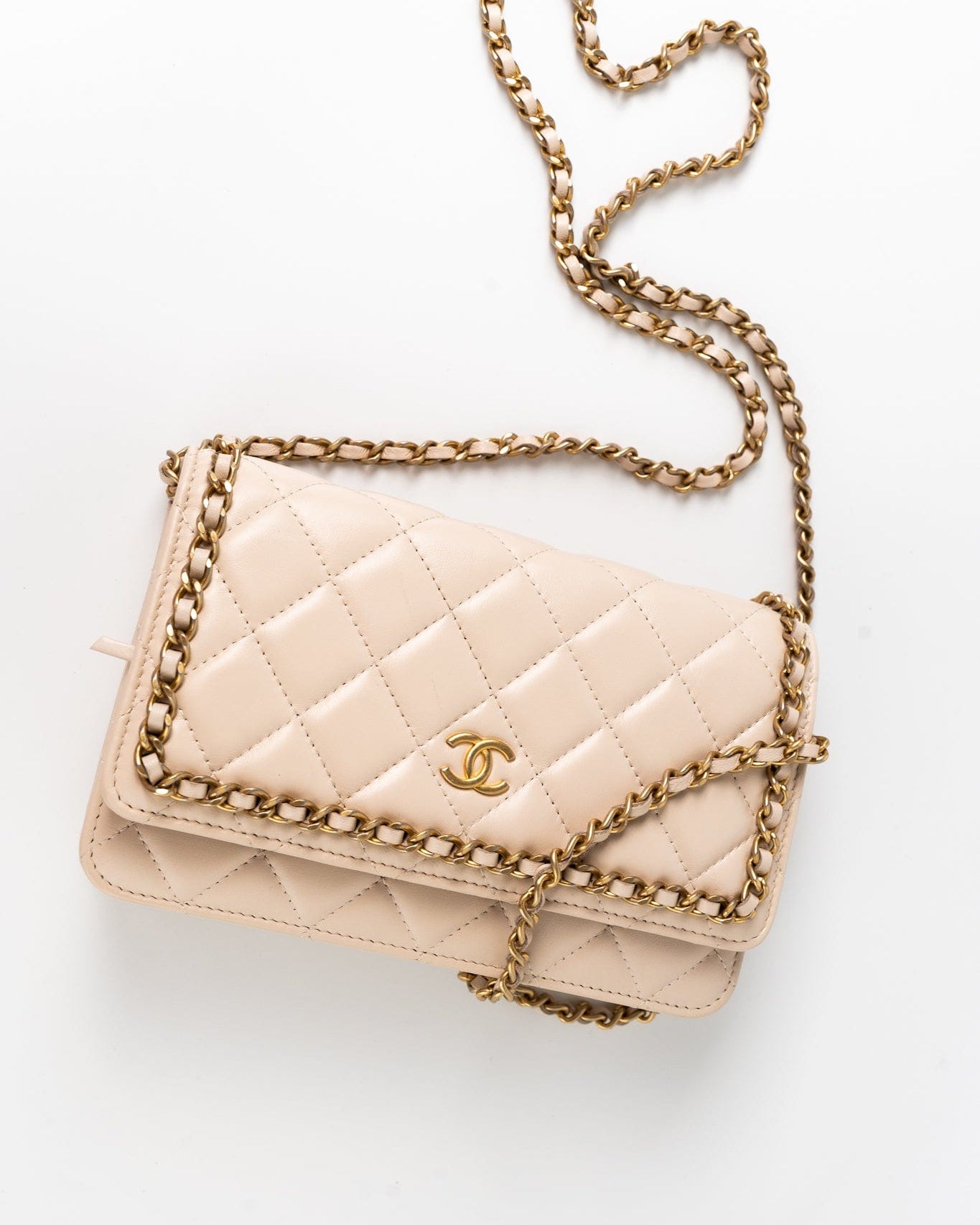 CHANEL Handbag Cream Nude/ Ecru Lambskin Quilted Chain Around Wallet On Chain WOC Aged Gold Hardware - Redeluxe