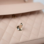 CHANEL Handbag Pink 22c Beige Caviar Quilted Classic Flap Light Gold Hardware - Redeluxe