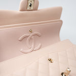 CHANEL Handbag Pink 22c Beige Caviar Quilted Classic Flap Light Gold Hardware - Redeluxe