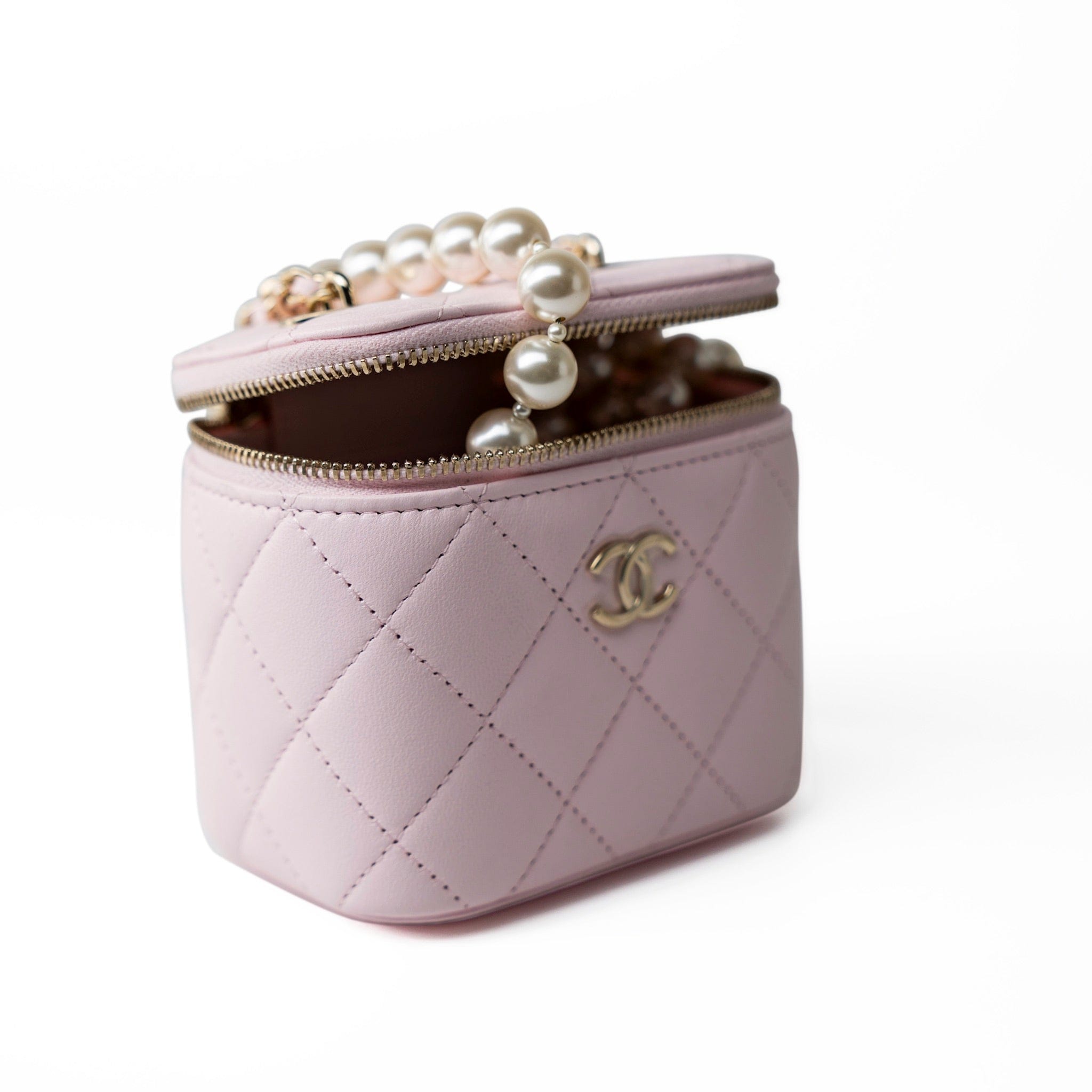 CHANEL Handbag Pink Light Pink Lambskin Quilted Mini Vanity Case With Pearl Chain - Redeluxe