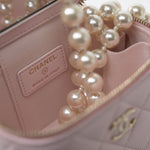 CHANEL Handbag Pink Light Pink Lambskin Quilted Mini Vanity Case With Pearl Chain - Redeluxe