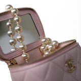 CHANEL Handbag Pink Light Pink Lambskin Quilted Mini Vanity Case With Pearl Chain - Redeluxe