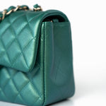 CHANEL Handbag Single flap / Green 22A Iridescent Green Lambskin Quilted Mini Rectangular Single Flap Light Gold Hardware - Redeluxe