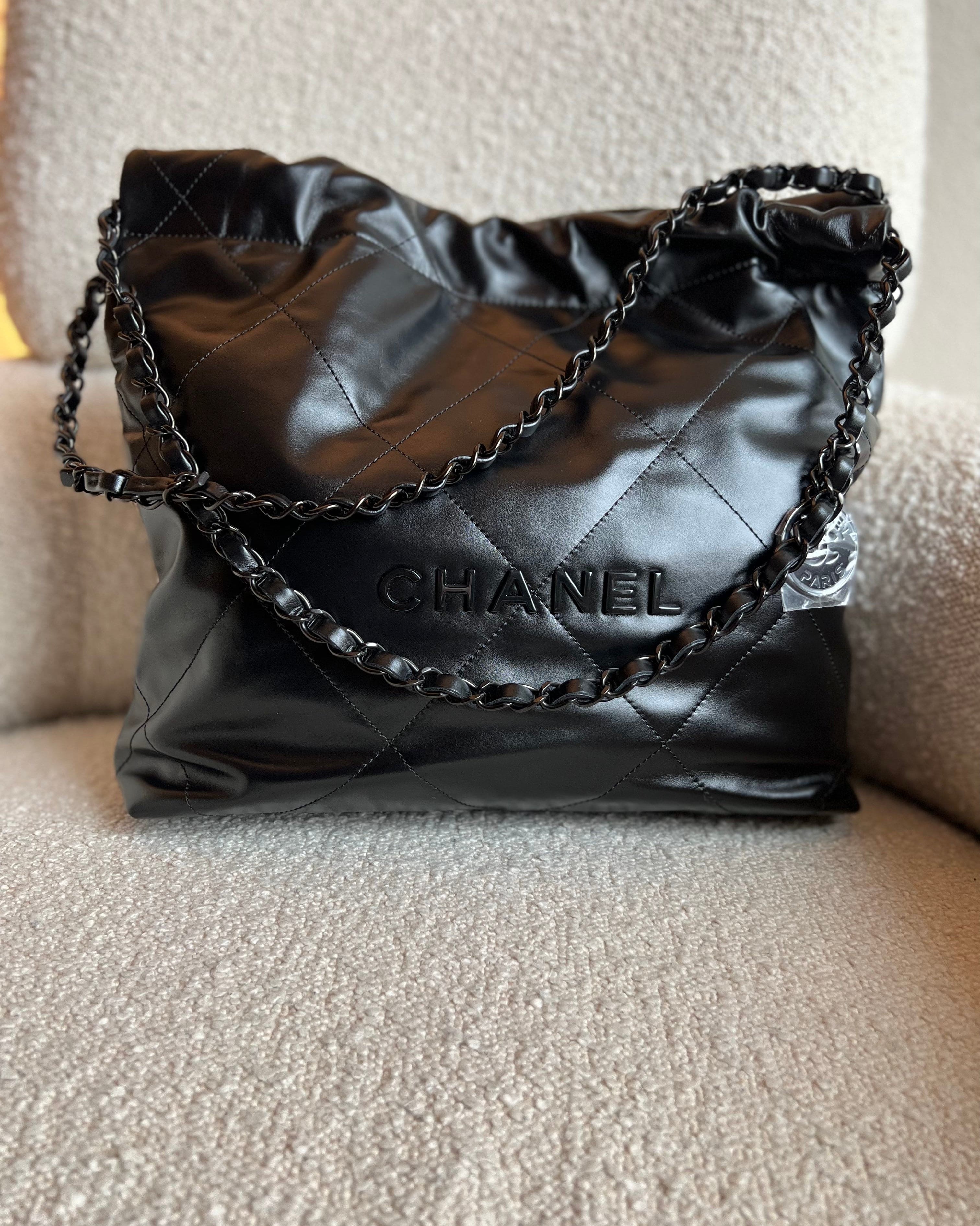 CHANEL Handbag So Black Calfskin Quilted Drawstring 22 Bag small Black Hardware - Redeluxe