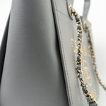 CHANEL Tote Grey Caviar Studded Deauville Tote Light Gold Hardware - Redeluxe